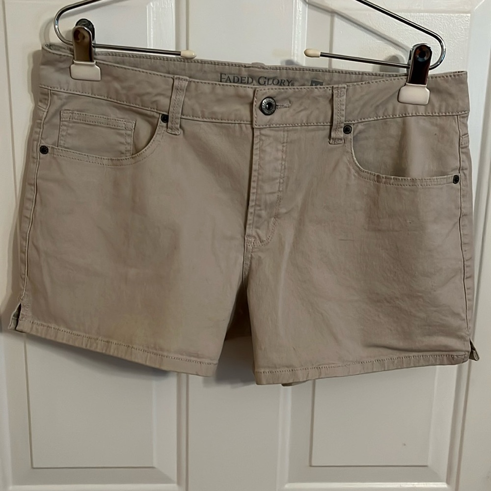 Women’s Tan Jean shorts.  Machine wash cold tumble dry warm.